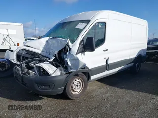 2024 Ford Transit Cargo with VIN 1FTBR1C83RKA91627, listed as a IAAI auction lot 41455595 with 12,010 mi miles and . Bid and sale history available at DreamBid. Image 2.