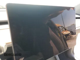 2024 Tesla Model Y Long Range с VIN 7SAYGDEE4RA243738, выставлен на аукционе Copart как лот 48953885 с пробегом Не указан миль и Списание • Salvage title. История ставок и продаж доступна на DreamBid. Изображение 9.
