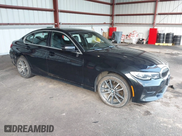 2021 BMW 3 Series 330i xDrive with VIN 3MW5R7J0XM8B58647, listed as a IAAI auction lot 42027965 with 34,230 mi miles. Bid and sale history available at carsss.com. Image 1.