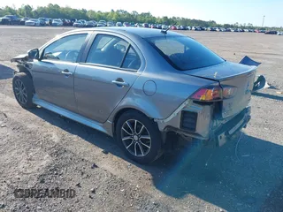 2015 Mitsubishi Lancer SE with VIN JA32V2FWXFU023626, listed as a IAAI auction lot 42012381 with 143,981 mi miles. Bid and sale history available at carsss.com. Image 3.