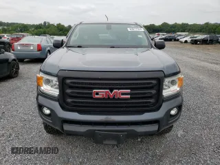 2015 GMC Canyon 2WD SLE with VIN 1GTH5BEA7F1158758, listed as a Copart auction lot 63617524 with 102,744 mi miles and Salvage Title. Bid and sale history available at carsss.com. Image 5.