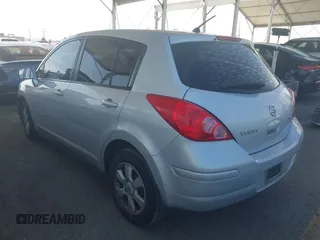2009 Nissan Versa 1.8 SL with VIN 3N1BC13E29L406619, listed as a IAAI auction lot 41761728 with 115,510 mi miles. Bid and sale history available at carsss.com. Image 3.