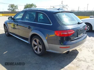 2014 Audi allroad A4 Premium Plus z VIN WA1UFAFL1EA151304, wystawiony jako IAAI lot #42387022 z przebiegiem 98 225 mil mil oraz . Historia ofert i sprzedaży dostępna na DreamBid. Obrazek 3.