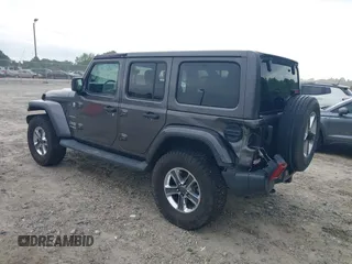 2018 Jeep Wrangler Unlimited Sahara with VIN 1C4HJXEN8JW303023, listed as a IAAI auction lot 42138631 with 72,463 mi miles and . Bid and sale history available at DreamBid. Image 6.