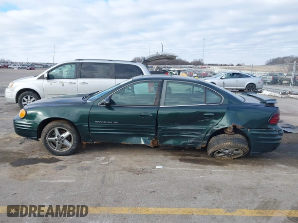2002 Pontiac Grand Am SE1 z VIN 1G2NF52FX2C165546, wystawiony jako IAAI lot #41290065 z przebiegiem 149 834 mil mil oraz . Historia ofert i sprzedaży dostępna na DreamBid. Obrazek 13.