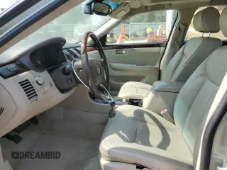 2007 Cadillac DTS Performance with VIN 1G6KD57987U138020, listed as a Copart auction lot 70678514 with 159,441 mi miles and Salvage Title. Bid and sale history available at DreamBid. Image 7.