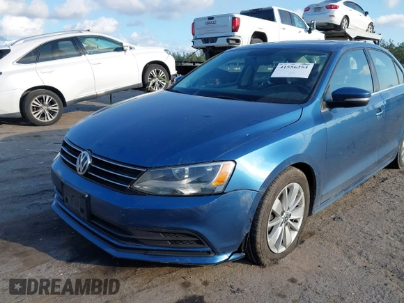 2016 Volkswagen Jetta Sedan 1.4T SE with VIN 3VWD67AJ0GM328412, listed as a IAAI auction lot 41556254 with 137,814 mi miles. Bid and sale history available at carsss.com. Image 6.