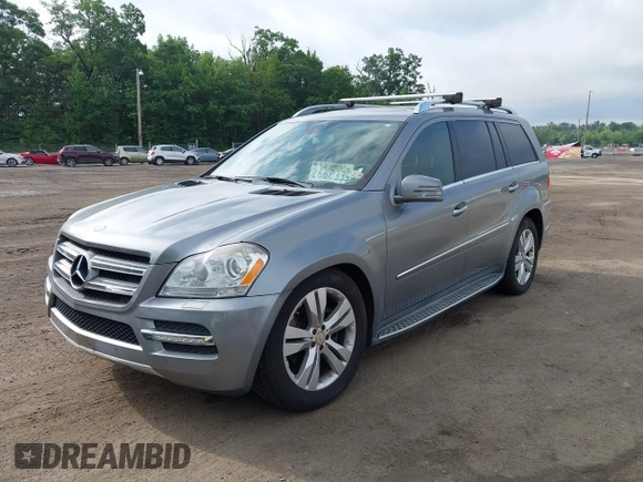 2012 Mercedes-Benz GL 450 z VIN 4JGBF7BEXCA766840, wystawiony jako IAAI lot #42521600 z przebiegiem 154 811 mil mil oraz . Historia ofert i sprzedaży dostępna na DreamBid. Obrazek 17.