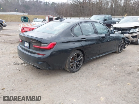2020 BMW 3 Series M340i with VIN WBA5U7C02LAF54184, listed as a IAAI auction lot 41490697 with 57,363 mi miles. Bid and sale history available at carsss.com. Image 4.