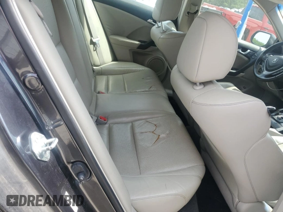 2012 Acura TSX z VIN JH4CU2F4XCC007997, wystawiony jako Copart lot #59993885 z przebiegiem 124 287 mil mil oraz Szkoda całkowita • Salvage title. Historia ofert i sprzedaży dostępna na DreamBid. Obrazek 10.