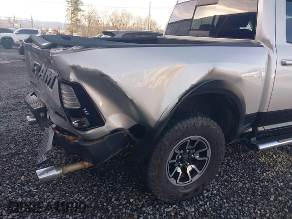 2017 Ram 1500 Rebel with VIN 1C6RR7YT2HS681533, listed as a IAAI auction lot 41559307 with 145,150 mi miles and . Bid and sale history available at DreamBid. Image 18.