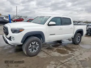 2023 Toyota Tacoma 4WD SR with VIN 3TYCZ5AN6PT105809, listed as a Copart auction lot 51166685 with 16,878 mi miles and Salvage Title. Bid and sale history available at carsss.com. Image 1.