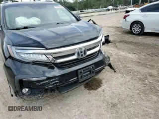 2021 Honda Pilot Touring 8-Passenger with VIN 5FNYF5H96MB000075, listed as a Copart auction lot 79339844 with 53,078 mi miles and Salvage Title. Bid and sale history available at DreamBid. Image 11.