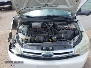 2009 Ford Focus SE with VIN 1FAHP35NX9W203482, listed as a IAAI auction lot 41870714 with 184,823 mi miles. Bid and sale history available at carsss.com. Image 10.