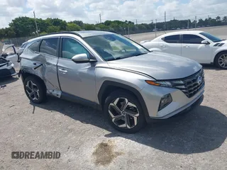 2022 Hyundai Tucson SEL z VIN 5NMJF3AE7NH007789, wystawiony jako IAAI lot #42161818 z przebiegiem 54 335 mil mil oraz . Historia ofert i sprzedaży dostępna na DreamBid. Obrazek 1.