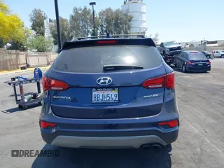 2018 Hyundai Santa Fe 2.0T z VIN 5XYZU4LA8JG537427, wystawiony jako IAAI lot #42349692 z przebiegiem 148 764 mil mil oraz . Historia ofert i sprzedaży dostępna na DreamBid. Obrazek 16.