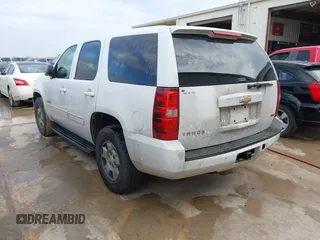 2010 Chevrolet Tahoe LS with VIN 1GNMCAE3XAR215407, listed as a IAAI auction lot 41570899 with 197,401 mi miles and . Bid and sale history available at DreamBid. Image 3.
