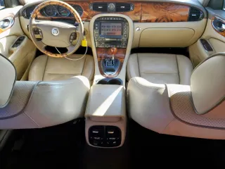 2008 Jaguar XJ with VIN SAJWA79B58SH20211, listed as a Copart auction lot 46951055 with 144,655 mi miles and Salvage Title. Bid and sale history available at carsss.com. Image 8.