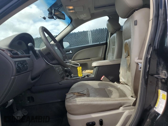 2008 Ford Taurus Limited with VIN 1FAHP25W78G128851, listed as a Copart auction lot 61254015 with 216,335 mi miles and Salvage title. Bid and sale history available at DreamBid. Image 7.