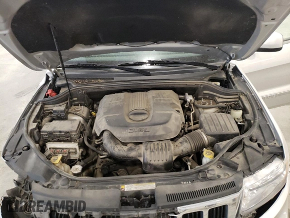 2011 Jeep Grand Cherokee 70th Anniversary with VIN 1J4RR4GG0BC666357, listed as a Copart auction lot 71726674 with 122,802 mi miles and Salvage Title. Bid and sale history available at carsss.com. Image 13.