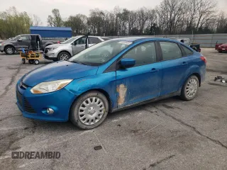 2012 Ford Focus SE with VIN 1FAHP3F22CL267562, listed as a Copart auction lot 53556895 with 179,828 mi miles and Salvage title. Bid and sale history available at DreamBid. Image 1.