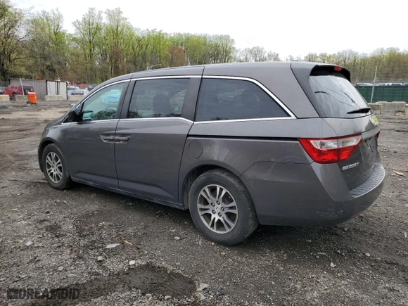 2012 Honda Odyssey EX-L with VIN 5FNRL5H62CB079729, listed as a Copart auction lot 52068685 with 181,468 mi miles and Salvage Title. Bid and sale history available at carsss.com. Image 2.
