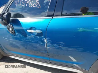 2022 MINI Countryman Cooper S z VIN WMZ53BR07N3N34260, wystawiony jako IAAI lot #42137868 z przebiegiem Nie podano mil oraz . Historia ofert i sprzedaży dostępna na DreamBid. Obrazek 17.