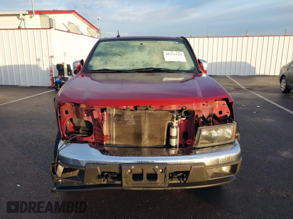 2010 GMC Canyon z VIN 1GTKTFDE5A8122221, wystawiony jako IAAI lot #41135125 z przebiegiem 114 489 mil mil oraz . Historia ofert i sprzedaży dostępna na DreamBid. Obrazek 13.