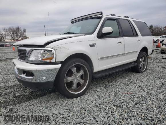 1997 Ford Expedition XLT with VIN 1FMEU17L5VLB80125, listed as a Copart auction lot 83892824 with 257,738 mi miles and Salvage title. Bid and sale history available at DreamBid. Image 1.