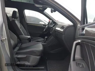 2022 Volkswagen Tiguan SE R-Line Black with VIN 3VVCB7AXXNM165748, listed as a IAAI auction lot 42178772 with 64,007 mi miles and . Bid and sale history available at DreamBid. Image 5.