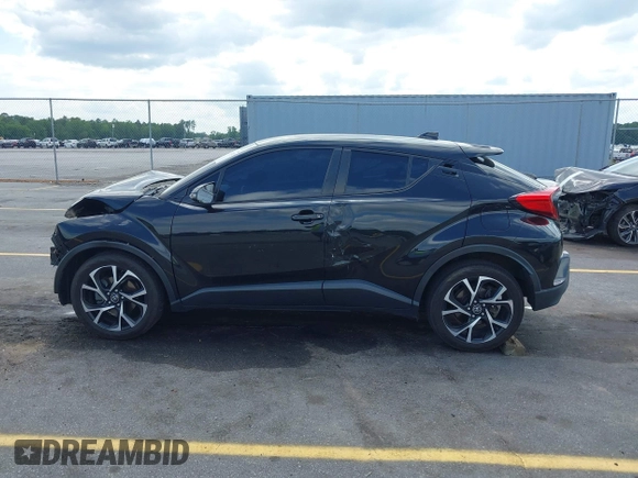 2019 Toyota C-HR XLE with VIN NMTKHMBX4KR096569, listed as a IAAI auction lot 42147017 with 111,569 mi miles and . Bid and sale history available at DreamBid. Image 14.