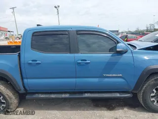 2019 Toyota Tacoma 4WD SR with VIN 3TMCZ5AN0KM260201, listed as a IAAI auction lot 42017048 with 49,216 mi miles. Bid and sale history available at carsss.com. Image 14.