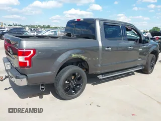 2018 Ford F-150 XL z VIN 1FTEW1E59JKC63060, wystawiony jako IAAI lot #42171237 z przebiegiem 113 405 mil mil oraz . Historia ofert i sprzedaży dostępna na DreamBid. Obrazek 4.