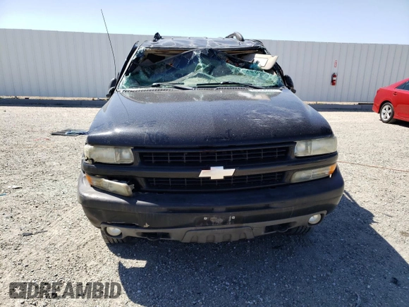 2002 Chevrolet Tahoe LT z VIN 1GNEK13T42R152851, wystawiony jako Copart lot #67958403 z przebiegiem 257 989 mil mil oraz Szkoda całkowita • Salvage title. Historia ofert i sprzedaży dostępna na DreamBid. Obrazek 5.