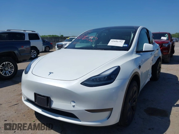 2024 Tesla Model Y with VIN 7SAYGDED0RA327806, listed as a IAAI auction lot 42096752 with 13,244 mi miles and . Bid and sale history available at DreamBid. Image 17.