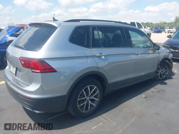 2021 Volkswagen Tiguan S with VIN 3VV1B7AX7MM117954, listed as a IAAI auction lot 42300223 with 45,587 mi miles and . Bid and sale history available at DreamBid. Image 4.