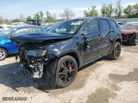 2021 Jeep Grand Cherokee SRT with VIN 1C4RJFDJ3MC628231, listed as a Copart auction lot 48934144 with 39,293 mi miles and Non Repairable. Bid and sale history available at carsss.com. Image 1.