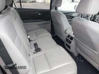 2017 Honda Pilot EX-L with VIN 5FNYF6H50HB101394, listed as a IAAI auction lot 42083318 with 159,359 mi miles and . Bid and sale history available at DreamBid. Image 8.