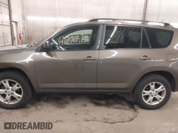 2011 Toyota RAV4 with VIN 2T3BF4DV8BW091196, listed as a IAAI auction lot 41870965 with 214,182 mi miles. Bid and sale history available at carsss.com. Image 15.