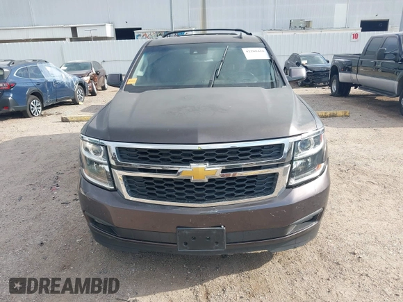 2015 Chevrolet Suburban LT with VIN 1GNSCJKCXFR175154, listed as a IAAI auction lot 42280418 with 227,373 mi miles and . Bid and sale history available at DreamBid. Image 12.