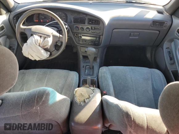 1992 Toyota Camry LE z VIN 4T1SK12E8NU044387, wystawiony jako Copart lot #43195915 z przebiegiem 279 199 mil mil oraz Szkoda całkowita • Salvage title. Historia ofert i sprzedaży dostępna na DreamBid. Obrazek 8.