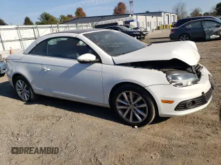 2015 Volkswagen Eos Komfort with VIN WVWBW8AH1FV000692, listed as a Copart auction lot 77866694 with 114,156 mi miles and Salvage Title. Bid and sale history available at DreamBid. Image 4.