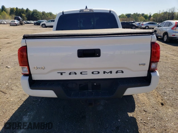 2021 Toyota Tacoma SR z VIN 3TYCZ5ANXMT032035, wystawiony jako Copart lot #54517835 z przebiegiem 81 582 mil mil oraz Szkoda całkowita • Salvage title. Historia ofert i sprzedaży dostępna na DreamBid. Obrazek 6.