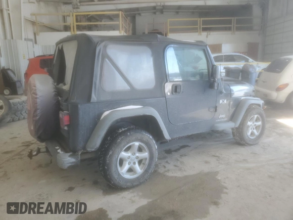 2004 Jeep Wrangler X with VIN 1J4FA39SX4P754012, listed as a Copart auction lot 45239915 with 160,473 mi miles and Salvage title. Bid and sale history available at DreamBid. Image 3.