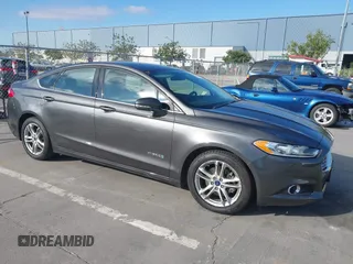 2016 Ford Fusion SE Hybrid with VIN 3FA6P0LU6GR145421, listed as a IAAI auction lot 42650918 with 105,990 mi miles and . Bid and sale history available at DreamBid. Image 1.