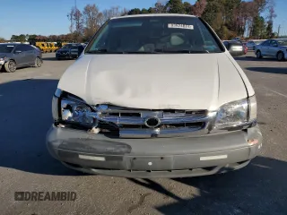 2000 Toyota Sienna LE with VIN 4T3ZF13C5YU201708, listed as a Copart auction lot 83924024 with 219,940 mi miles and Salvage Title. Bid and sale history available at carsss.com. Image 5.