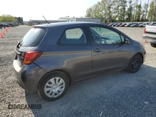 2015 Toyota Yaris L with VIN VNKJTUD33FA019160, listed as a Copart auction lot 54369235 with 65,595 mi miles and Salvage Title. Bid and sale history available at carsss.com. Image 3.