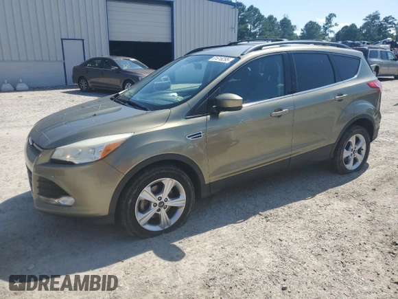 2013 Ford Escape SE with VIN 1FMCU0GX0DUD65115, listed as a Copart auction lot 61616295 with 175,375 mi miles and Salvage title. Bid and sale history available at DreamBid. Image 1.