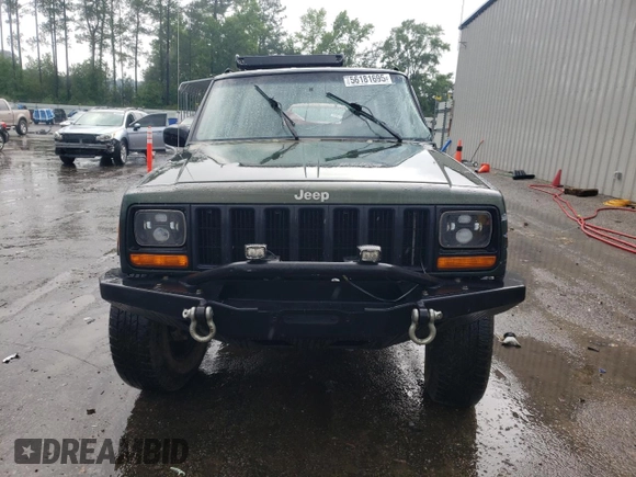 1997 Jeep Cherokee SE с VIN 1J4FJ28S5VL509588, выставлен на аукционе Copart как лот 56181695 с пробегом 313 430 миль миль и Списание • Salvage title. История ставок и продаж доступна на DreamBid. Изображение 5.