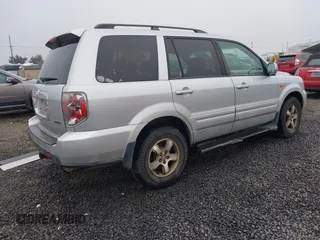 2007 Honda Pilot EX with VIN 2HKYF184X7H511937, listed as a IAAI auction lot 40992172 with 250,940 mi miles. Bid and sale history available at carsss.com. Image 4.